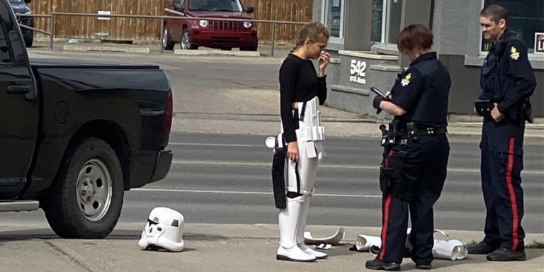 Cosplay Storm trooper trying to get customers’ attention taken down by real Storm troopers in Canada